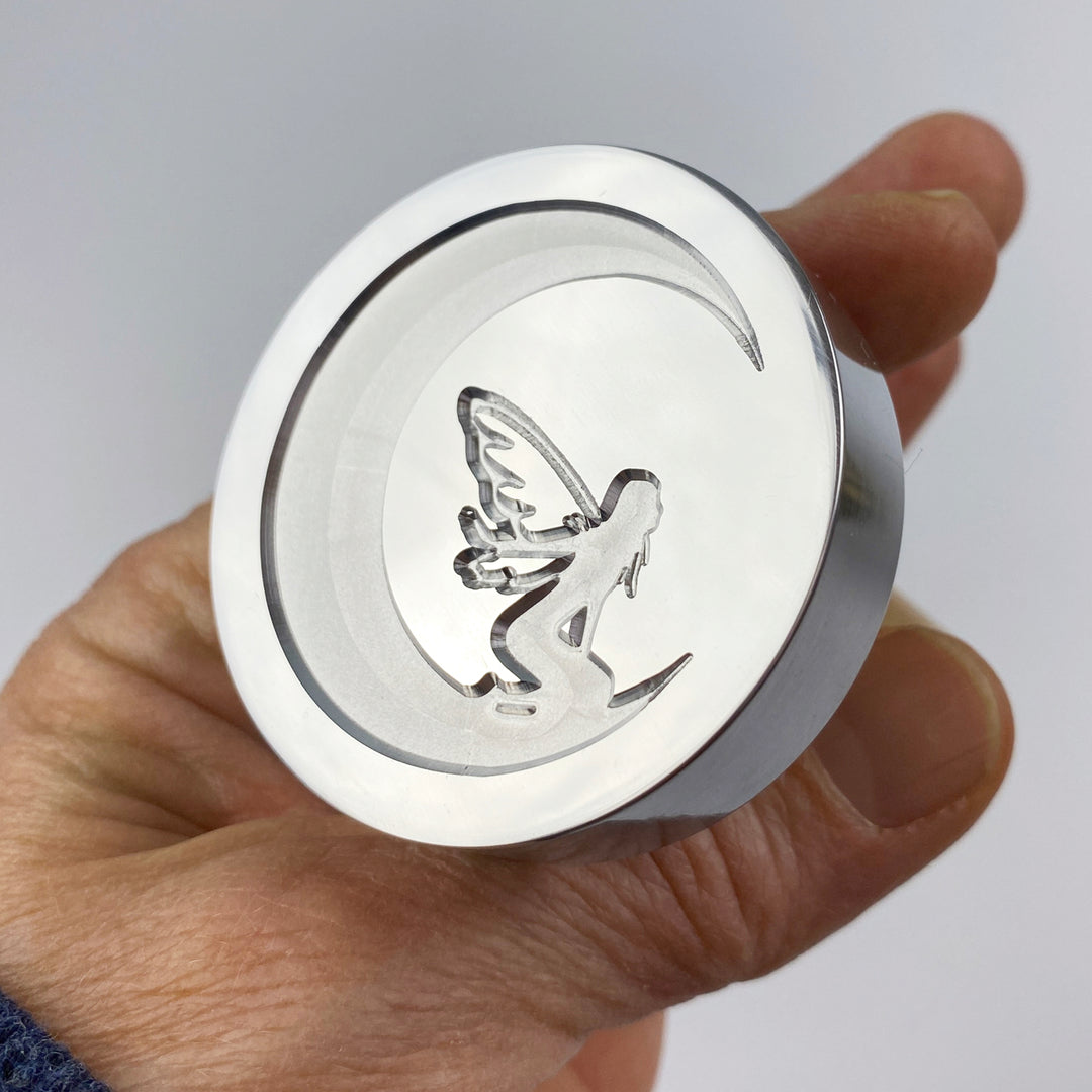 Let your imagination take flight with our Moon Faerie wax stamp.